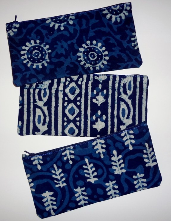 Indigo block printed cotton pouches with zippers. Set of three. 8" x 4". Made in India. A great hostess or holiday gift. $22